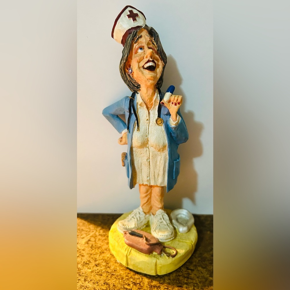 Vintage Russ Berrie nurse “feeling no pain”. Mint condition.